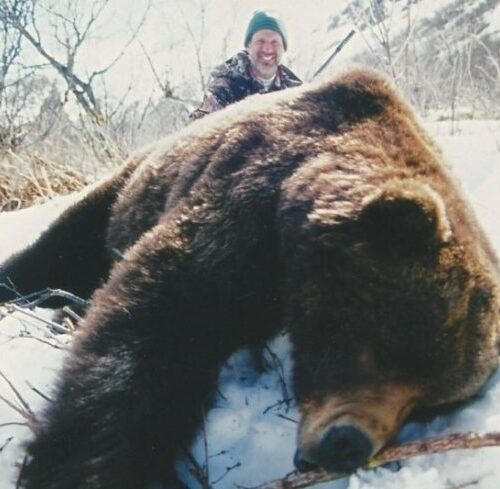 Hunter with a 10' 4" bear. As seen on ESPN.